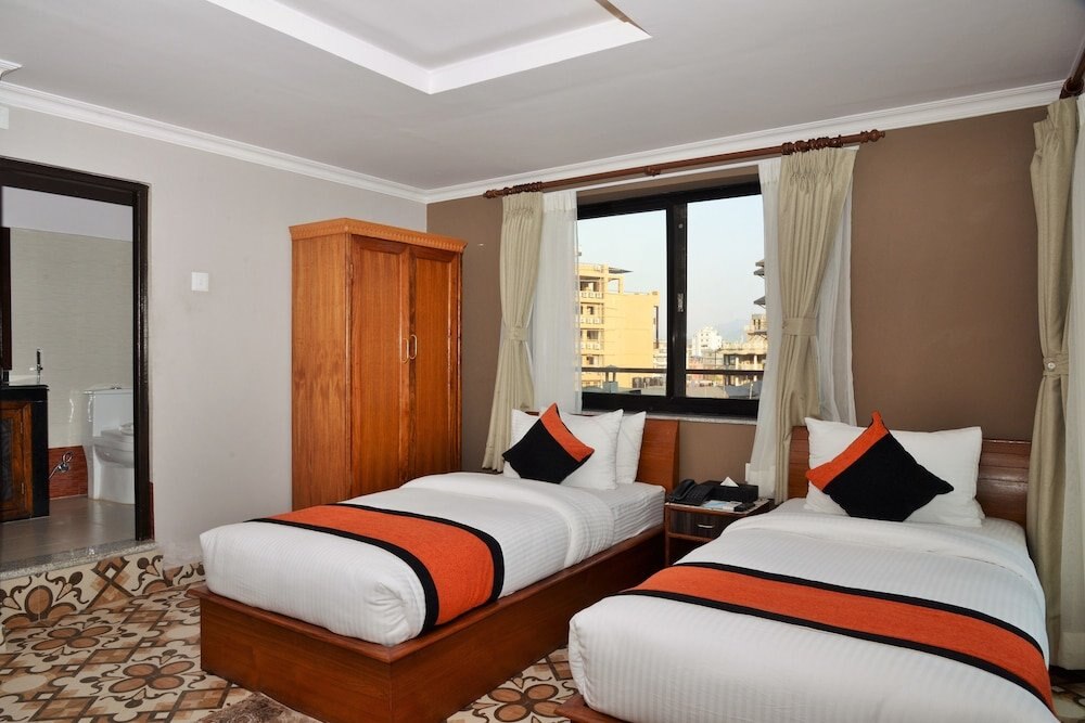 HOTEL RANIBAN ARCADE Room Type - Deluxe Twin Room