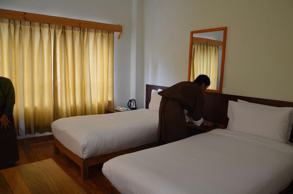Hotel Amodhara - Tap to explore photos