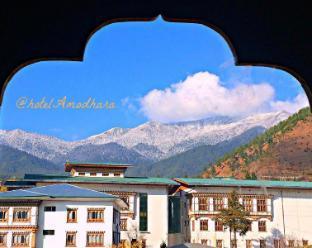 Hotel Amodhara - Tap to explore photos