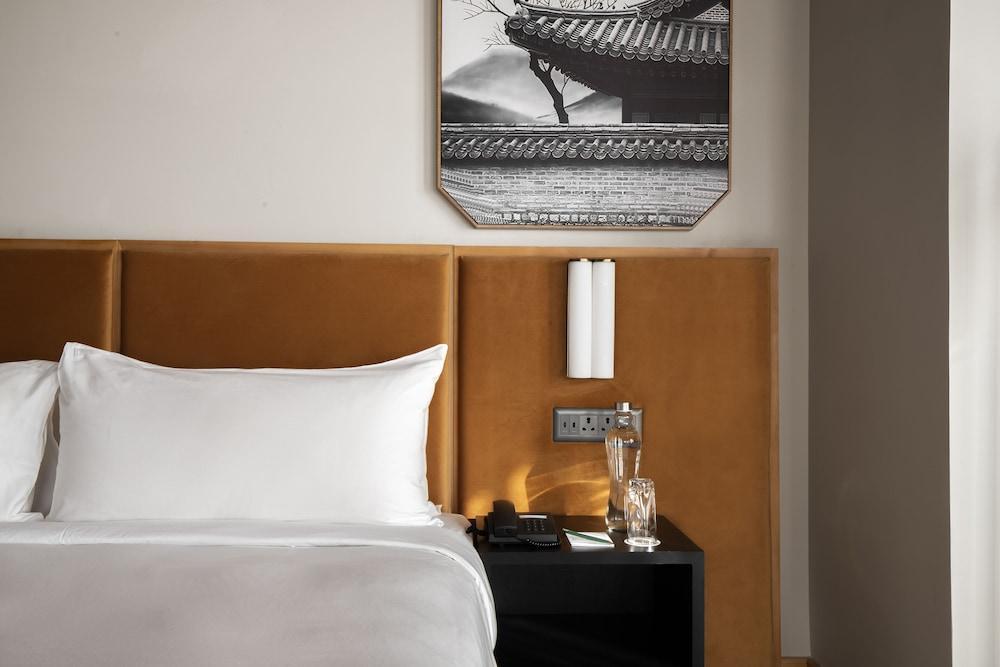 Zhiwa Ling Hotel - Tap to explore photos