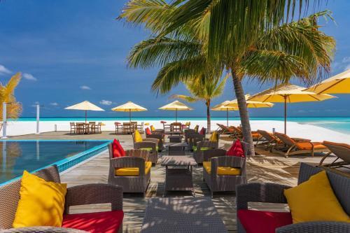 Dhigufaru Island Resort - Tap to explore photos