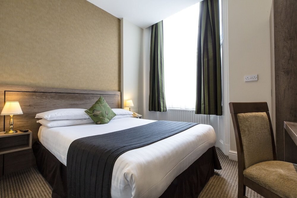 Kensington Gardens Hotel - Tap to explore photos