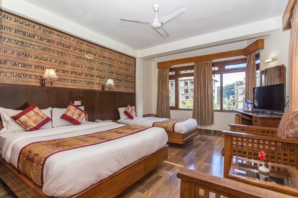 Hotel Tulsi Room Type - Superior Triple Room, Multiple Beds, Garden View