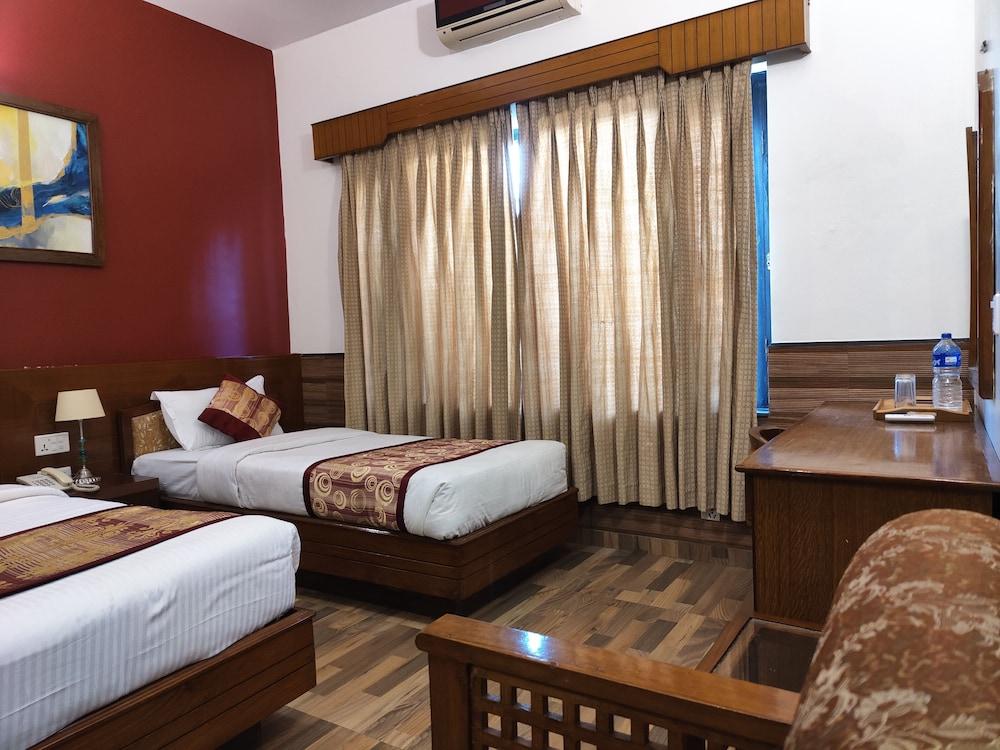 Hotel Tulsi Room Type - Family Triple Room, Multiple Beds