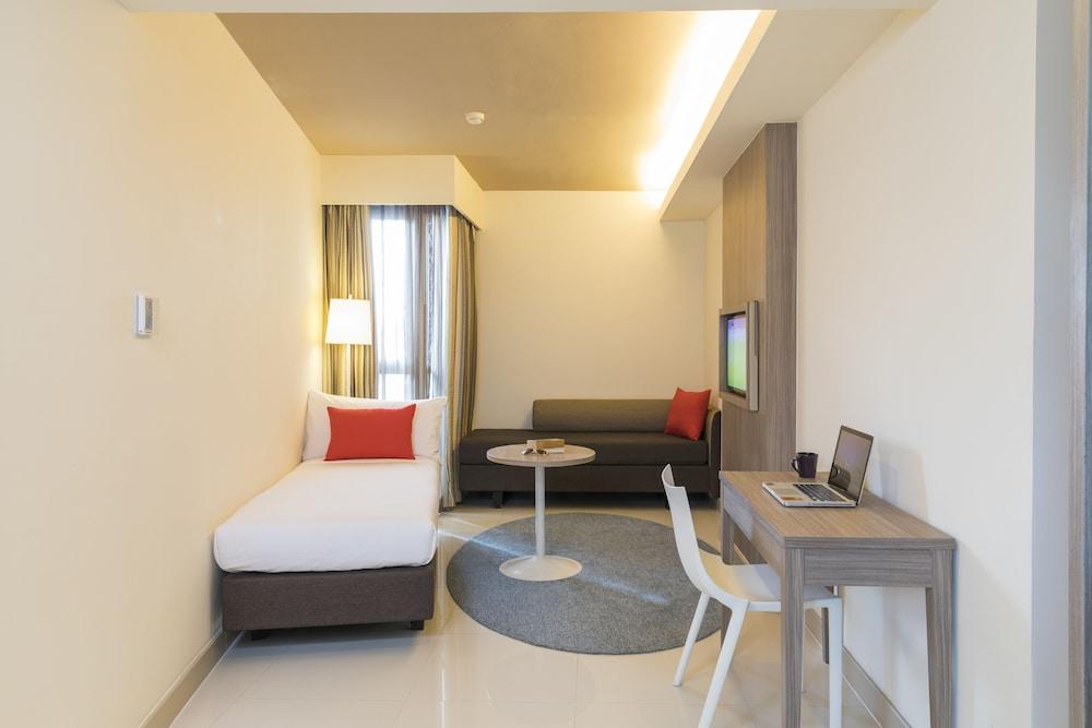 Travelodge Pattaya - Tap to explore photos