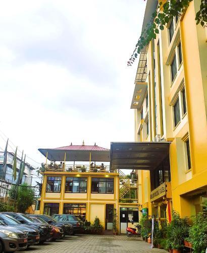 Yellow Pagoda Hotel - Tap to explore photos