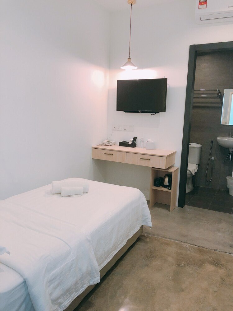 iO Hotel - Tap to explore photos