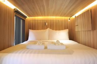Cube Boutique Capsule Hotel - Tap to explore photos