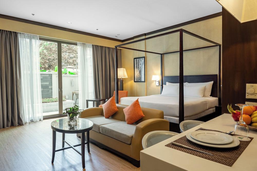 MiCasa All Suite Hotel - Tap to explore photos