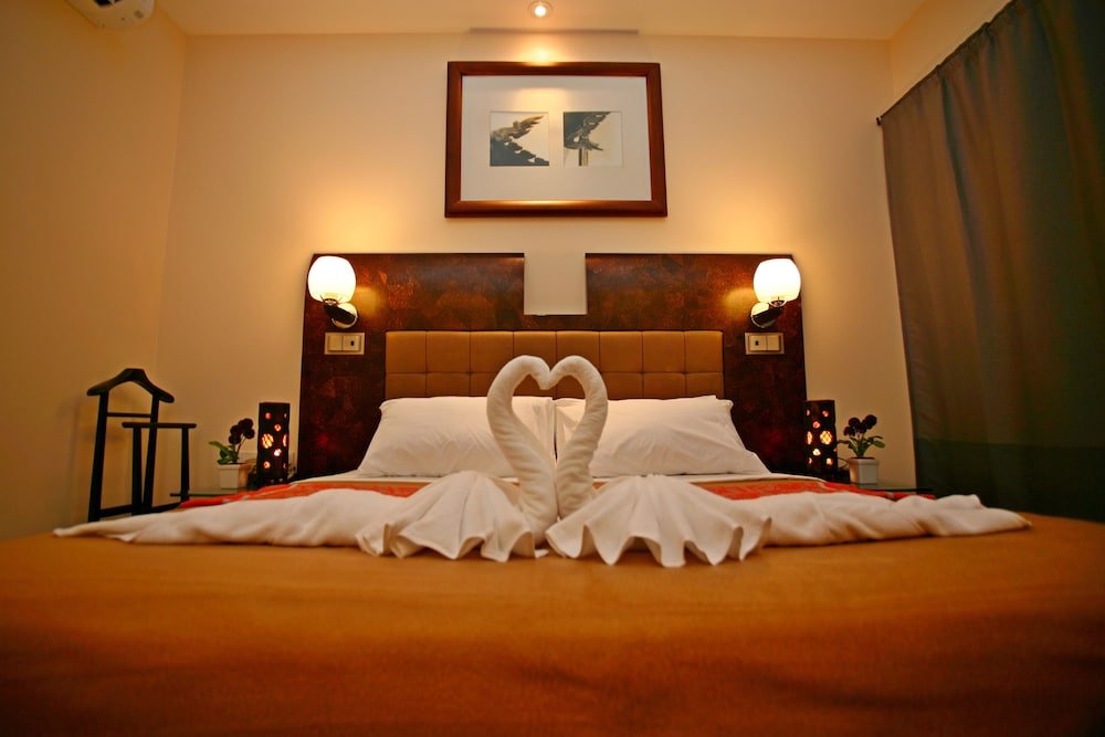 Lotusland Resort Room Type - Deluxe Room, 1 King Bed, Balcony, Garden View Lotusland Resort Room Type - Deluxe Room, 1 King Bed, Balcony, Garden View