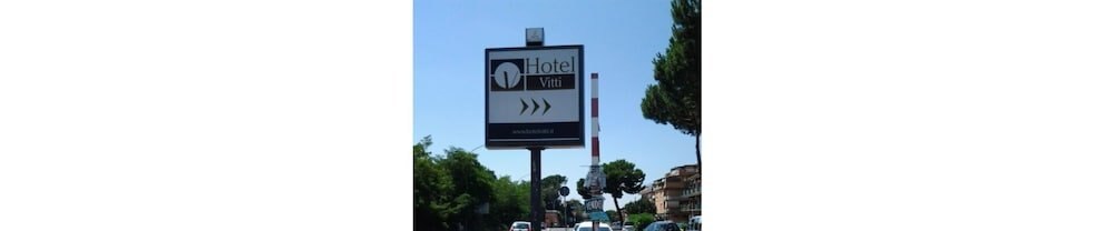 Hotel Vitti - Tap to explore photos
