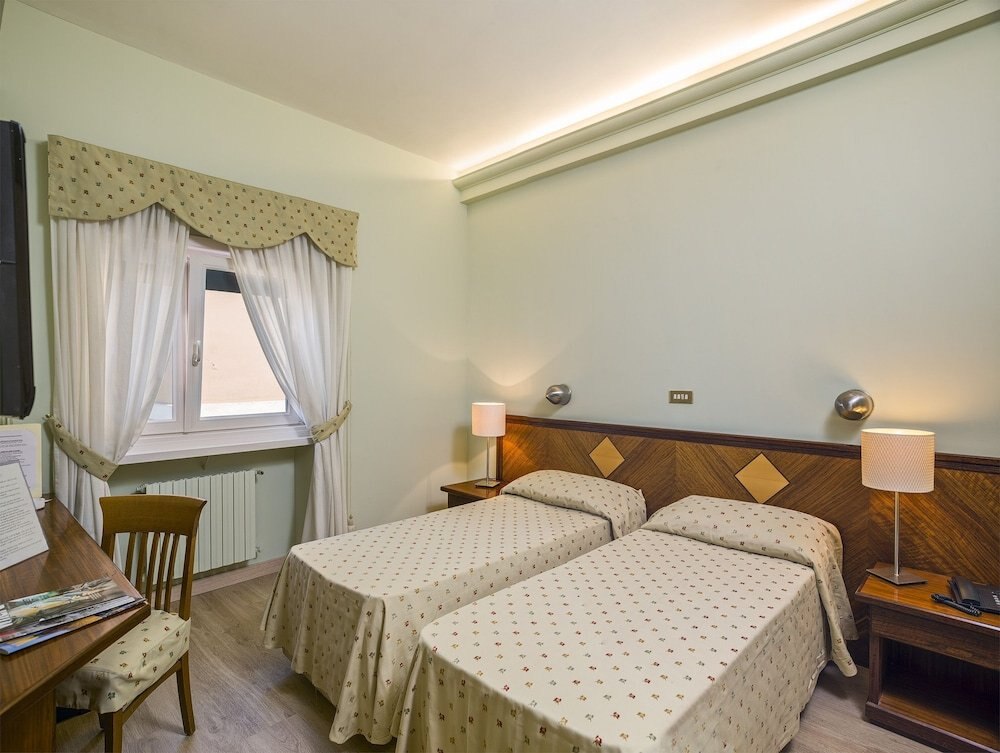 Cacciani Hotel - Tap to explore photos