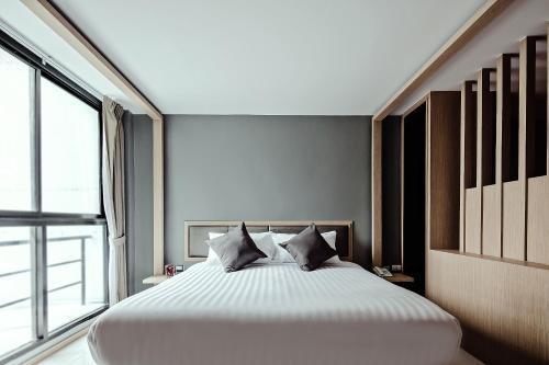 Three Sukhumvit Hotel - Tap to explore photos