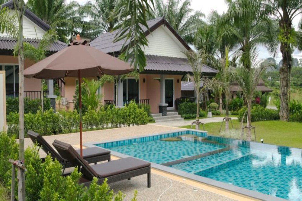 Palm Kiri Resort - Tap to explore photos
