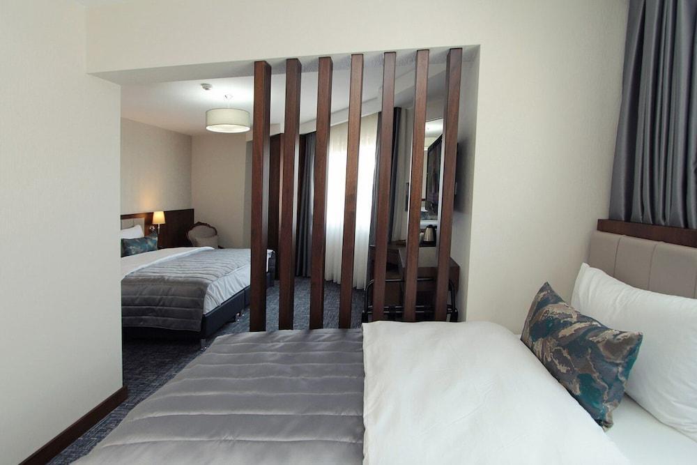 Hotel Pisa Room Type - Family Suite Hotel Pisa Room Type - Family Suite