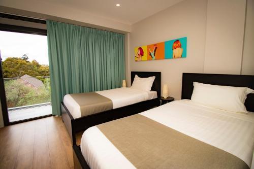 Studio 8 Residences - Adults Only - Tap to explore photos