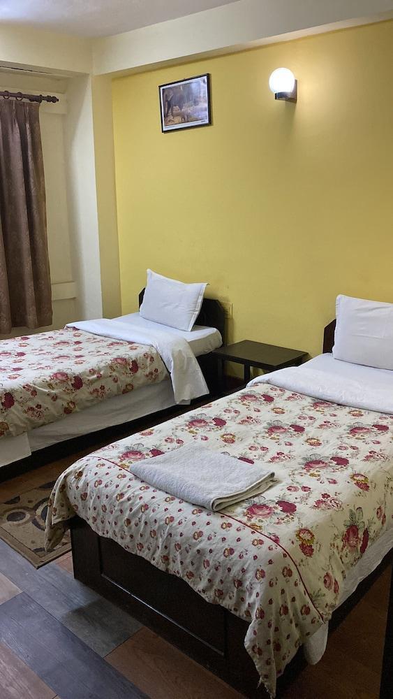 Bag Packer's Lodge Room Type - Economy Twin Room, Shared Bathroom