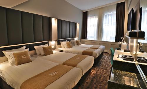 XO Hotels City Centre Room Type - Quadruple Room