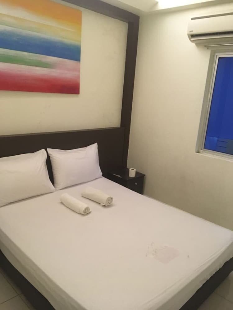 SPOT ON 90139 Hotel Galaxy - Tap to explore photos
