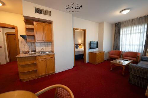 Kindi Suite Hotel - Tap to explore photos