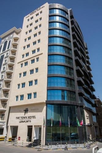 The Town Hotel Doha - Tap to explore photos