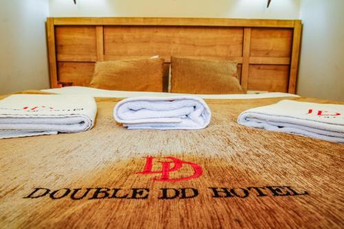 Double DD Hotel - Tap to explore photos