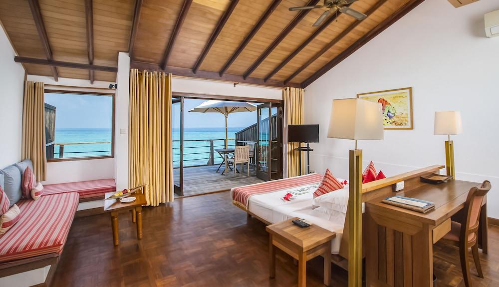 Reethi Beach Resort - Tap to explore photos