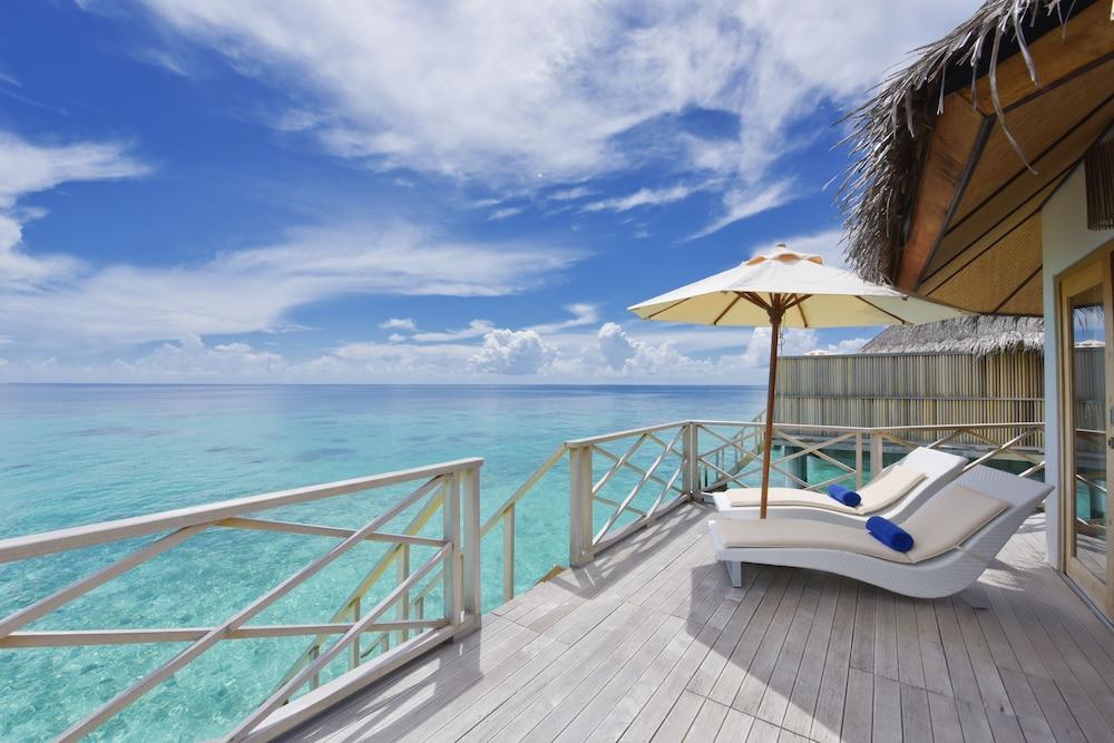 Angaga Island Resort & Spa - Tap to explore photos