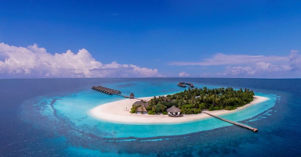 Angaga Island Resort & Spa - Tap to explore photos