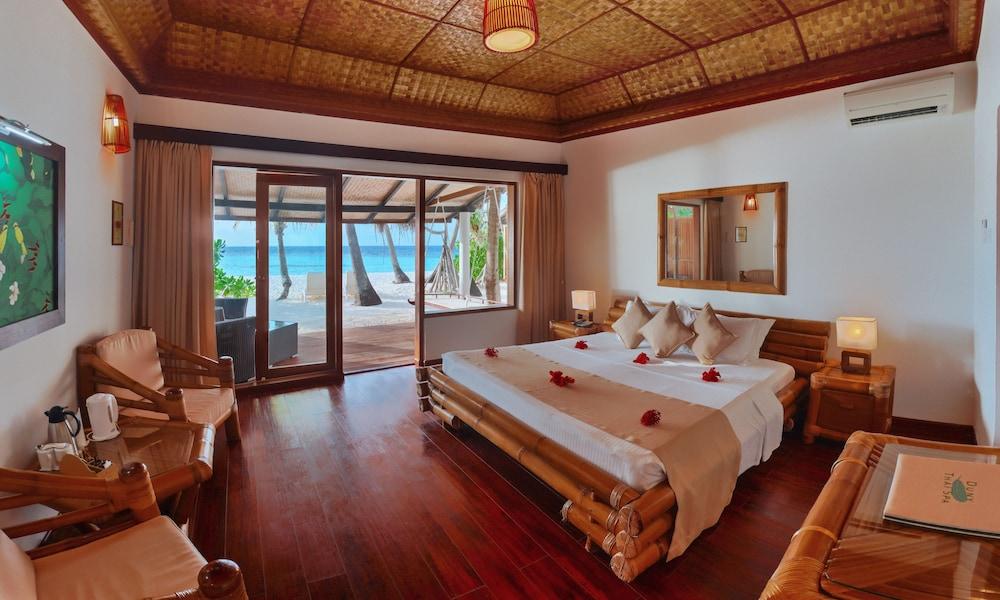 Angaga Island Resort & Spa - Tap to explore photos
