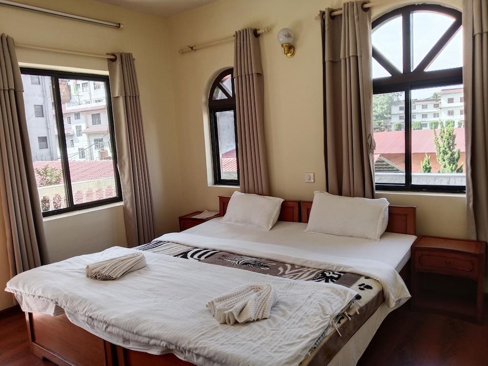 Hotel Norbu Sangpo - Tap to explore photos