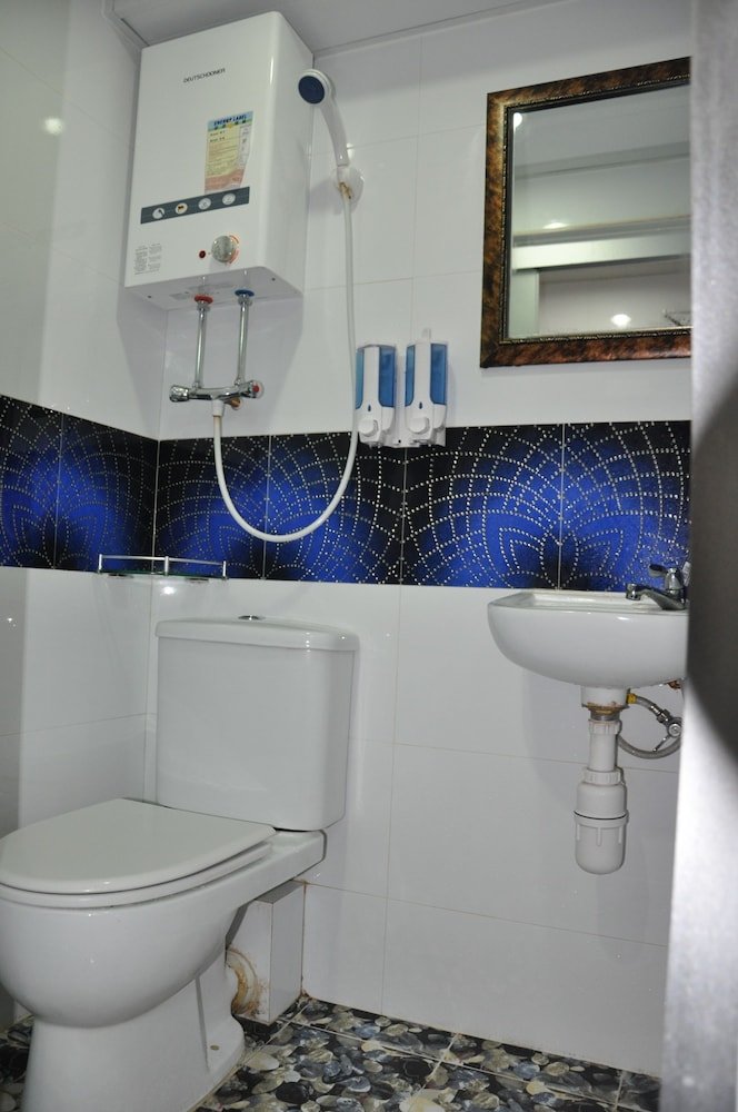 New Guangzhou Guesthouse - Hostel - Tap to explore photos