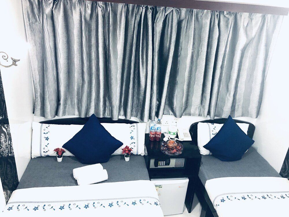 Ashoka Hostel Hong Kong Room Type - Triple Room With 1 Double Bed and 1 Single Bed Ashoka Hostel Hong Kong Room Type - Triple Room With 1 Double Bed and 1 Single Bed