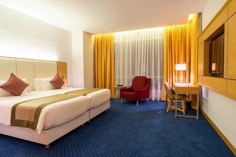 TAMU Hotel & Suites Room Type - Deluxe Room
