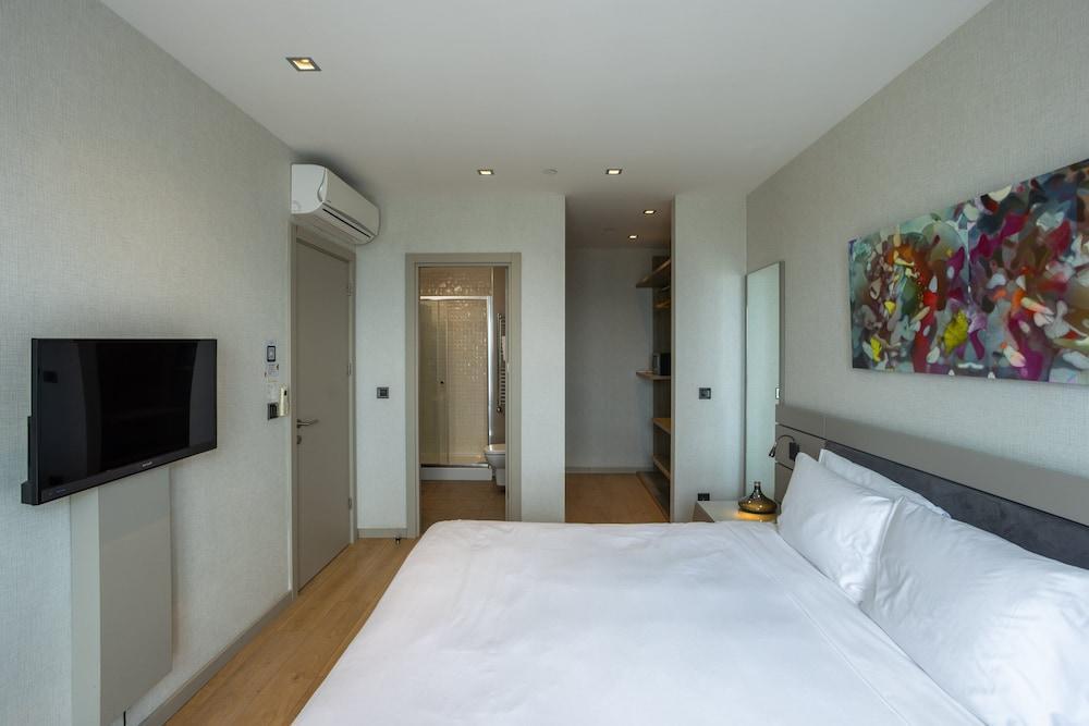 Antasya Suites - Tap to explore photos