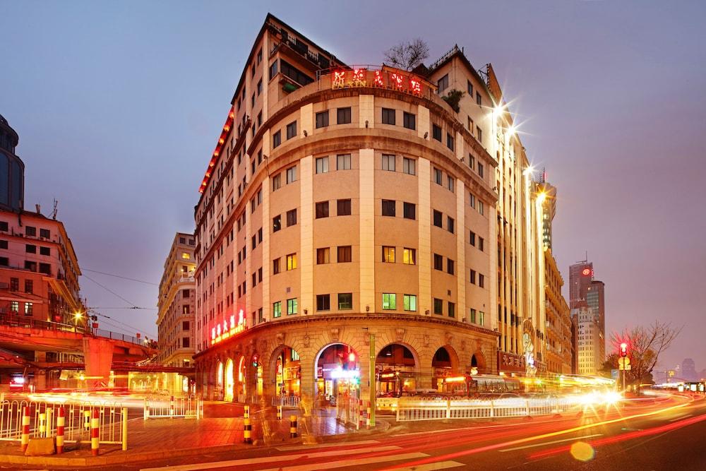 Xinhua Hotel - Tap to explore photos