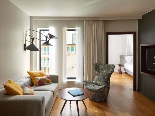 MOLITOR PARIS BY MGALLERY Room Type - POOL SUITE, 1 King size bed, lounge area, convertible sofa, pool view