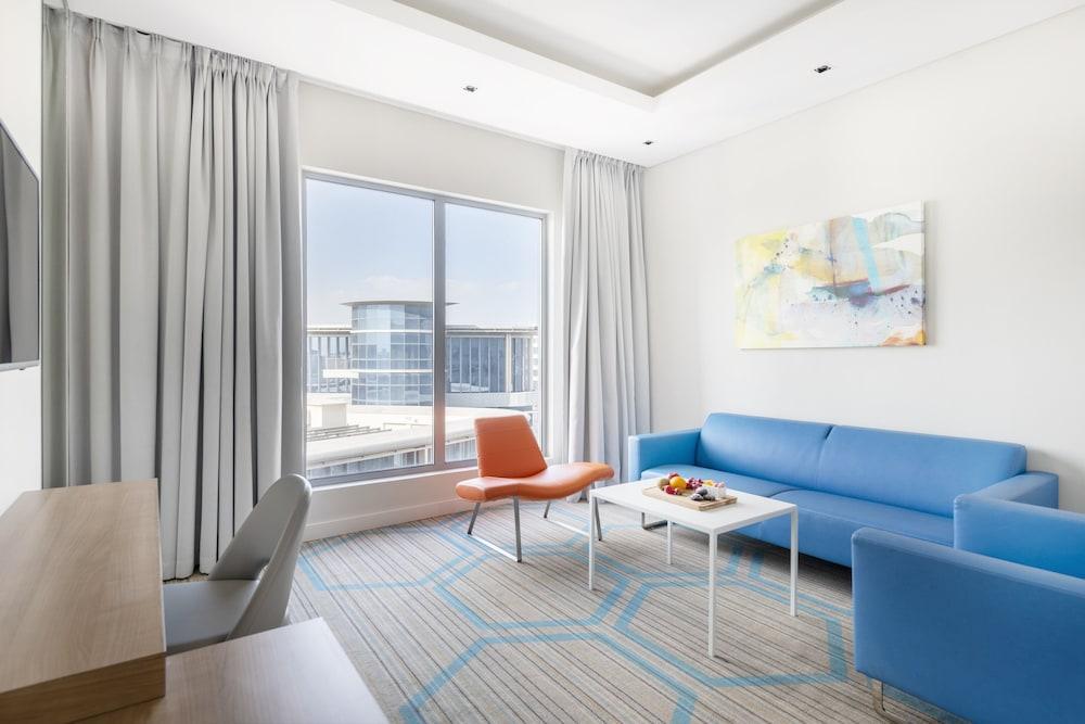 Holiday Inn Doha - The Business Park by IHG - Tap to explore photos