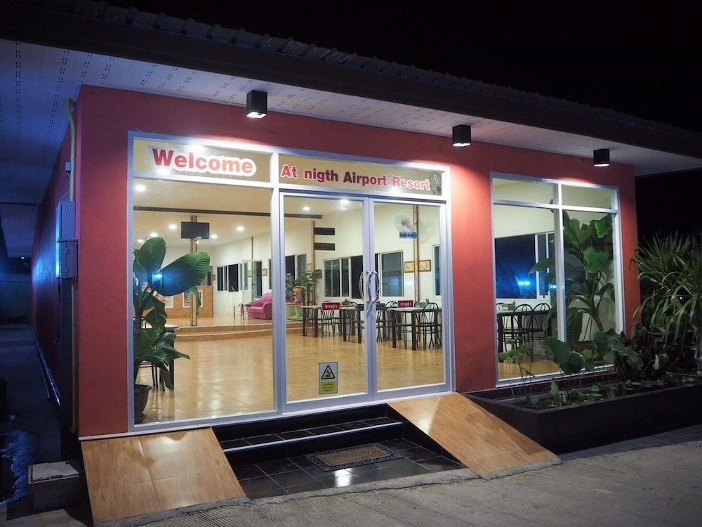 At Night Airport Resort - Tap to explore photos