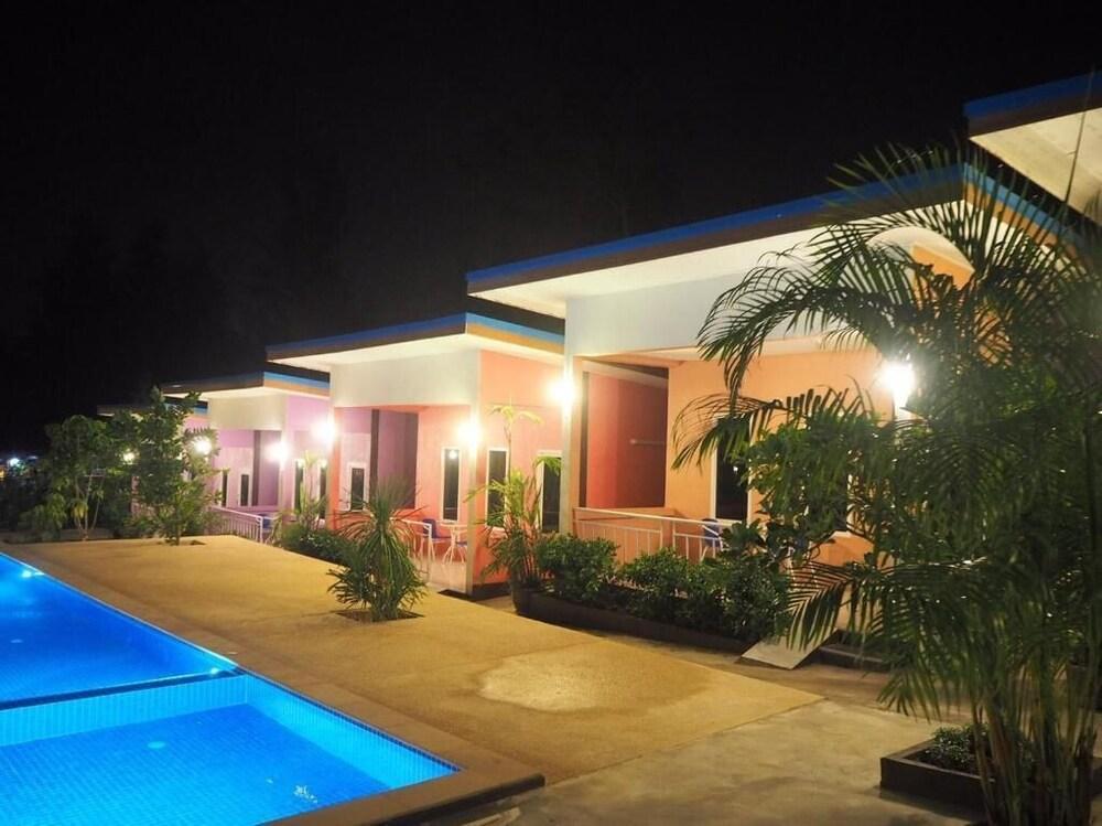At Night Airport Resort - Tap to explore photos