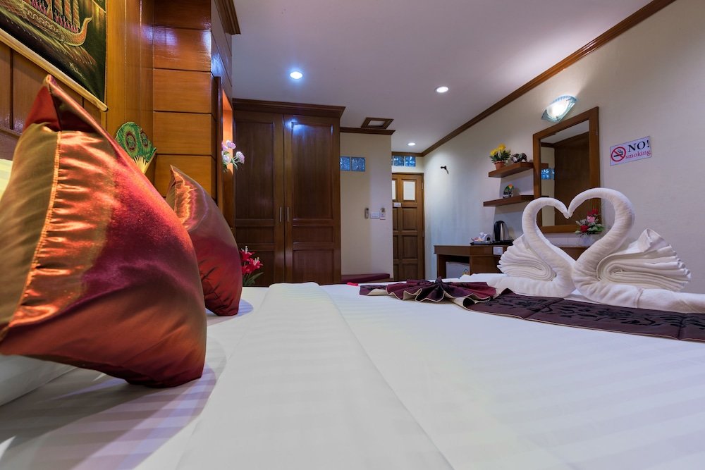 P R Patong Hotel - Tap to explore photos