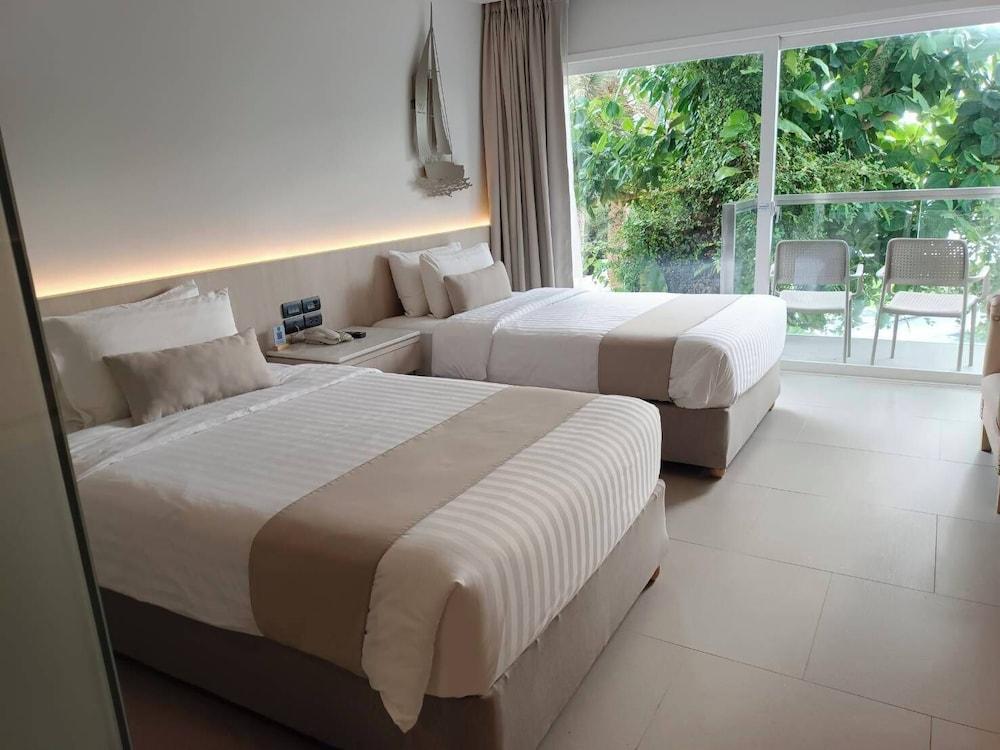 Worita Cove Hotel Room Type - Deluxe Poolview Twin Beds Worita Cove Hotel Room Type - Deluxe Poolview Twin Beds