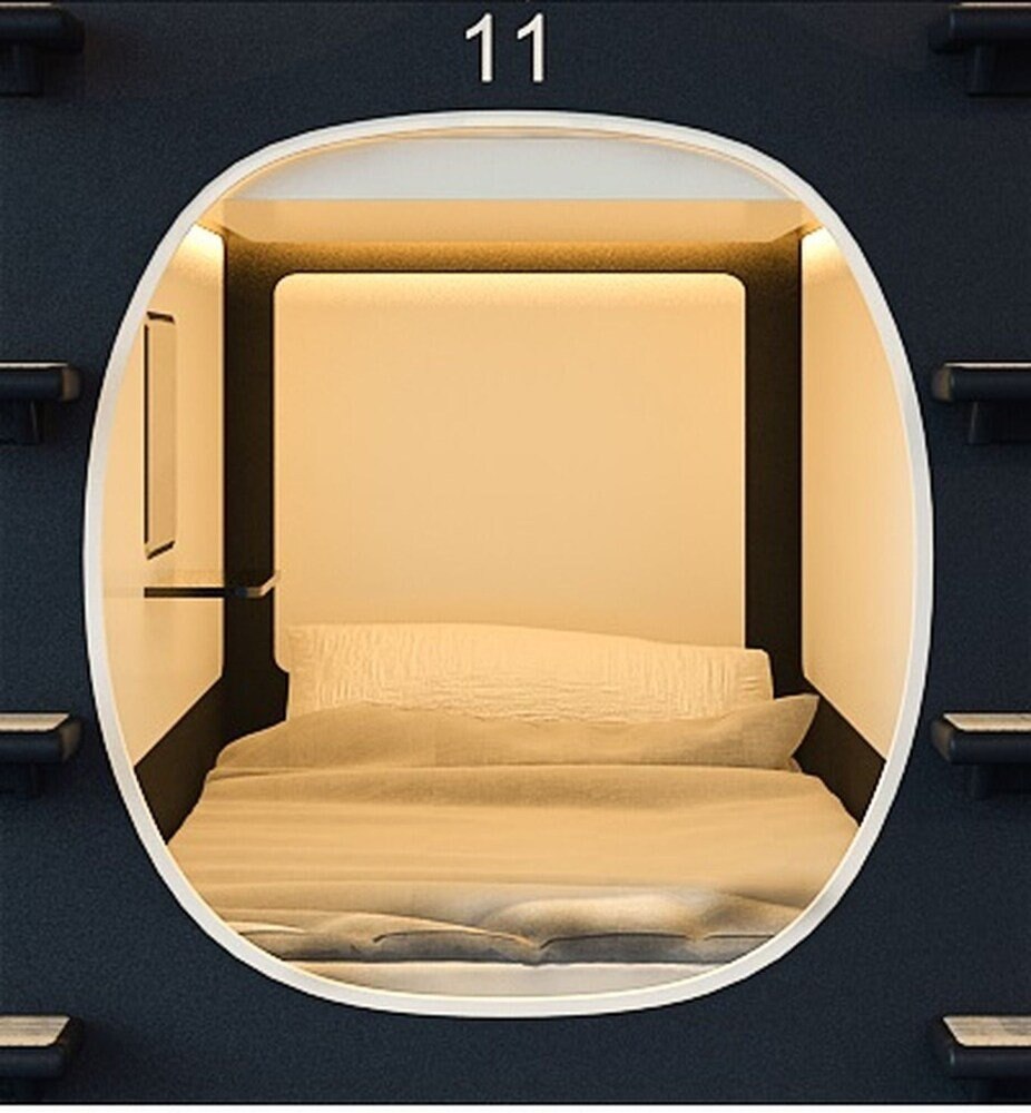 Qube Capsule Hotels - Tap to explore photos