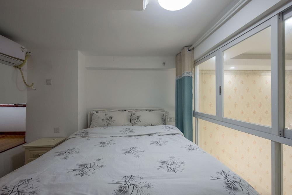 Kun Jiang Service Apartment Chimelong - Tap to explore photos