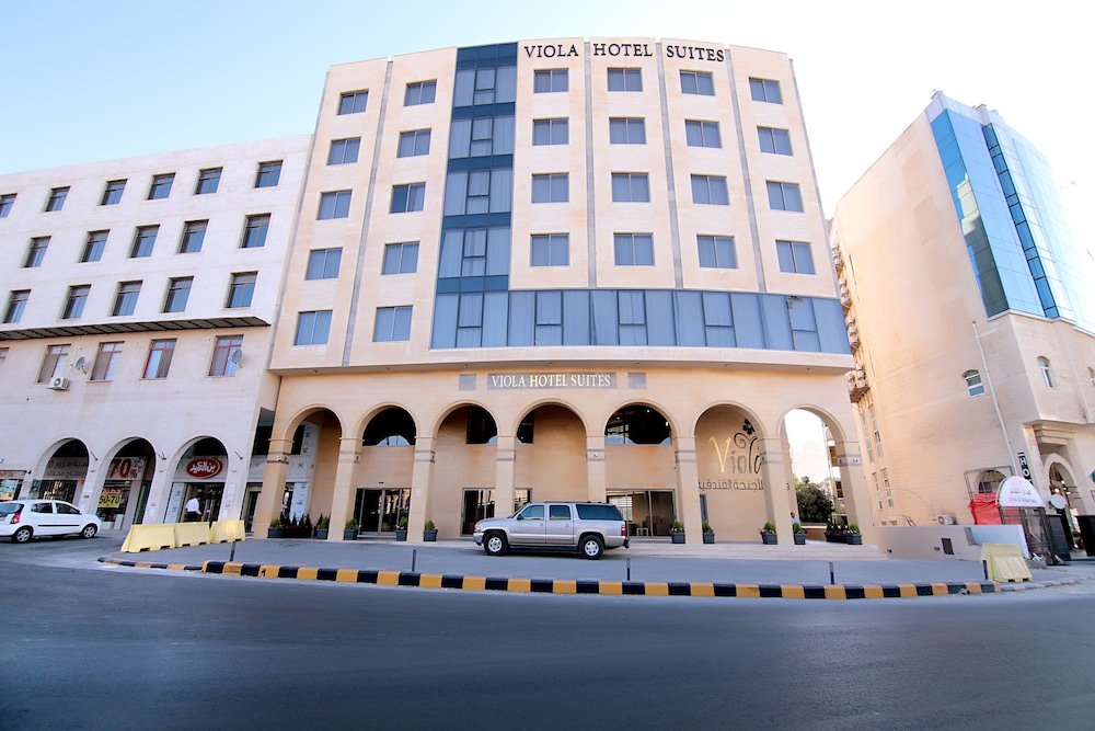 Viola Hotel Suites - Tap to explore photos