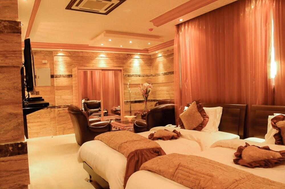 Jad Hotel Suites - Tap to explore photos