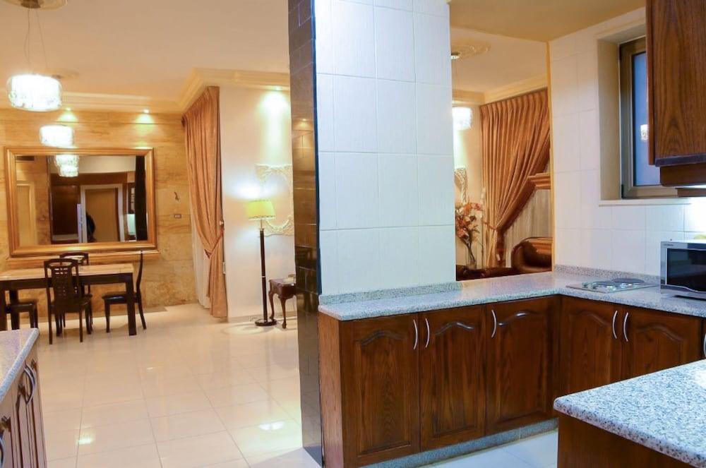 Jad Hotel Suites - Tap to explore photos