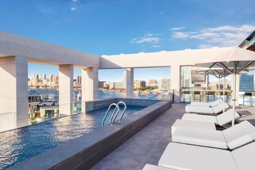 Curio Collection by Hilton Al Seef Heritage Hotel - Tap to explore photos