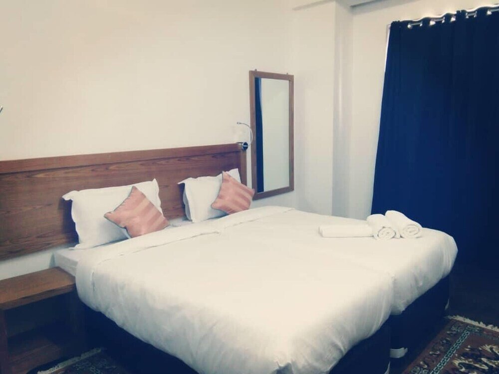 Amaa's Suites - Tap to explore photos