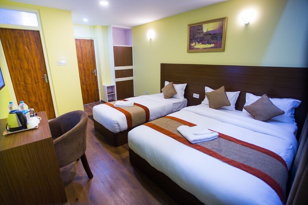 Hotel Rosemary Homes Room Type - Deluxe Triple Room